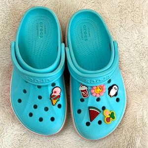 Crocs light blue and pink with charms!